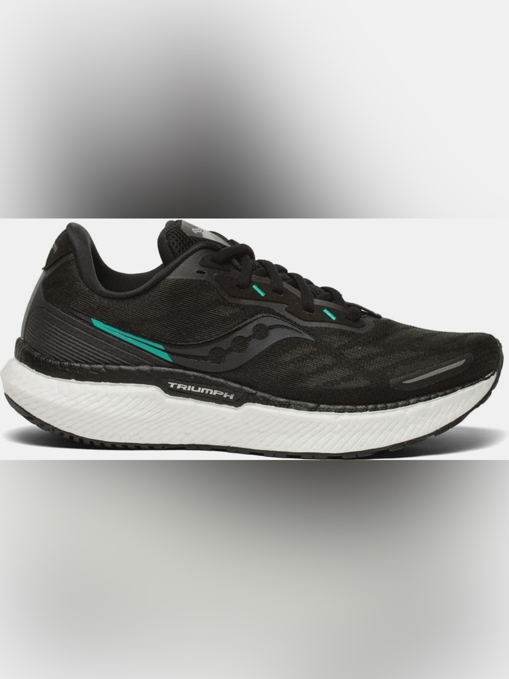 Saucony Triumph 19 running shoes in black an white with subtle teal accents 10.5
